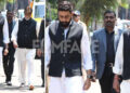 Amitabh Bachchan And Abhishek Bachchan Arrive At Manoj Kumar’s Final Rites