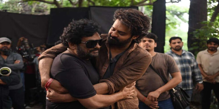 Image Discuss: Puri Jagannadh, Charmee Meet Prabhas on The Units of The Raja Saab