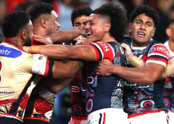 Roosters destroy Dolphins however Woolf howls over melee sin bins, Canine devour Warriors, Dragons shock Sharks