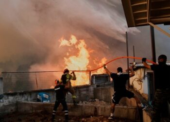 Wildfires unfold dangerously near southern European capitals