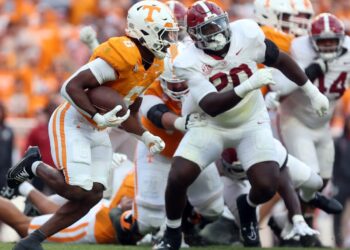 Alabama LB Jah-Marien Latham hospitalized with neck damage