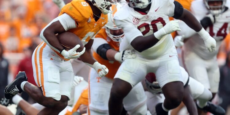 Alabama LB Jah-Marien Latham hospitalized with neck damage