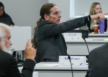 CDC’s vaccine advisers add COVID vaccine guidelines in contentious assembly : Photographs