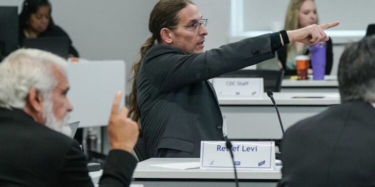 CDC’s vaccine advisers add COVID vaccine guidelines in contentious assembly : Photographs