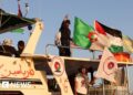 Activists say Gaza flotilla circled by Israeli warship