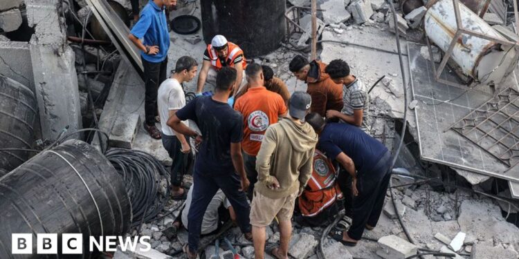 Israeli strikes in Gaza kill 50, rescuers say, after Hamas accused of killing Israeli soldier