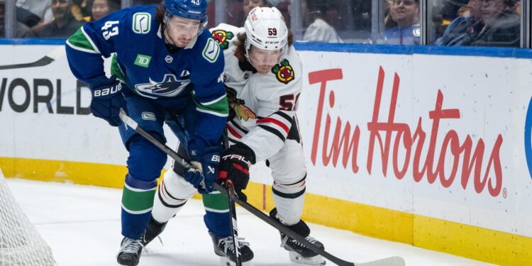 Bertuzzi’s hat trick lifts Blackhawks over Canucks